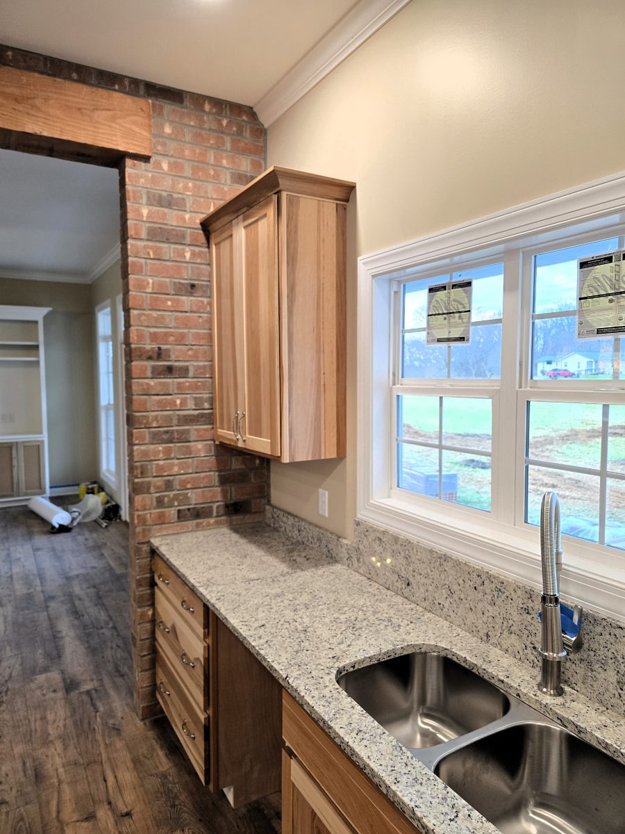 Hickory Cabinets, brick accent wall
